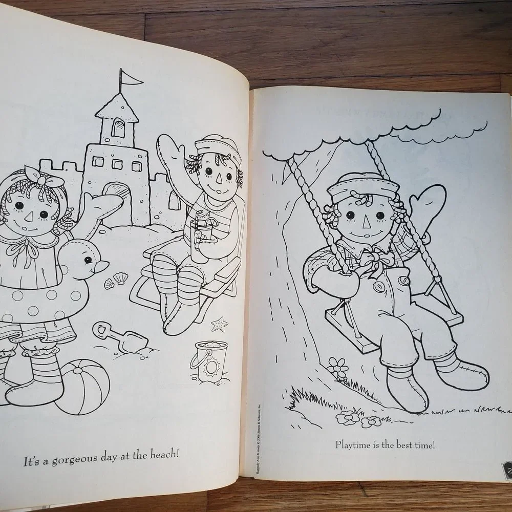 Raggedy Ann & Andy‎ patchwork crafts coloring book with fabric stickers 2006